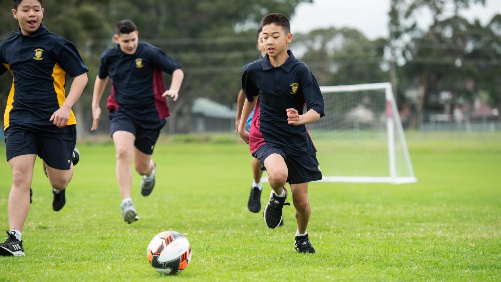 Students playing Soccer