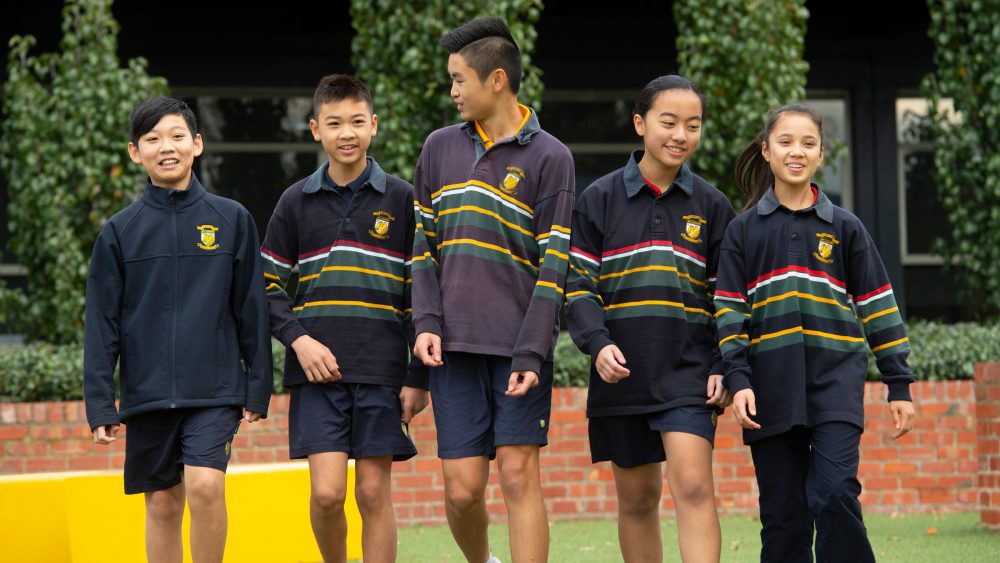 Students walking in play area